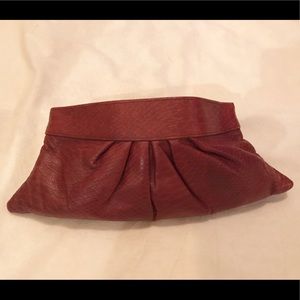 Lauren Merkin snakeskin clutch